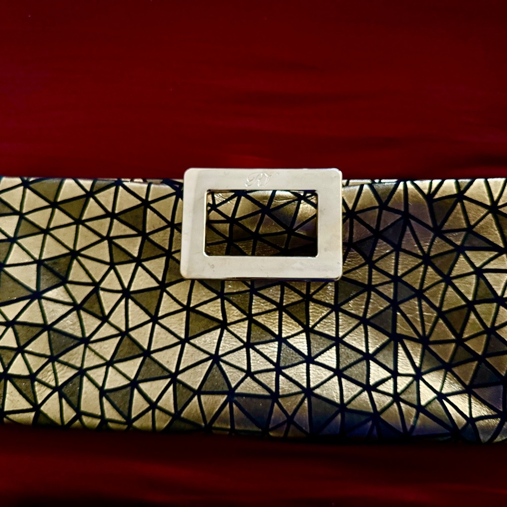 Roger Vivier golden leather clutch